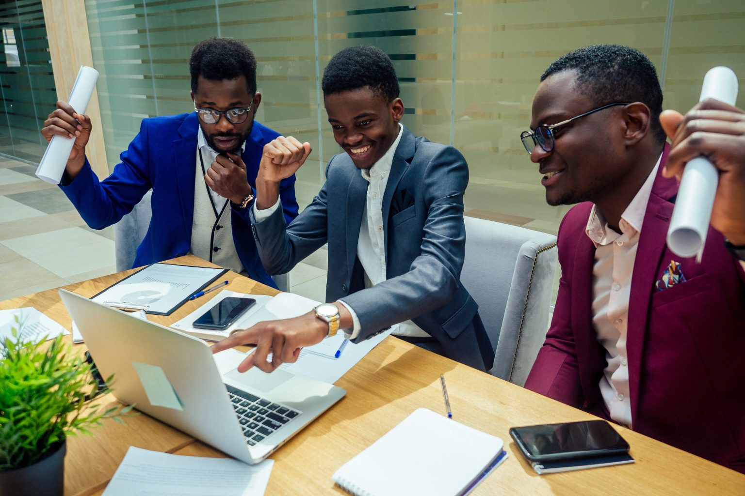 mixed-race-business-people-sitting-in-modern-offic-2024-10-31-04-28-51-utc (1)